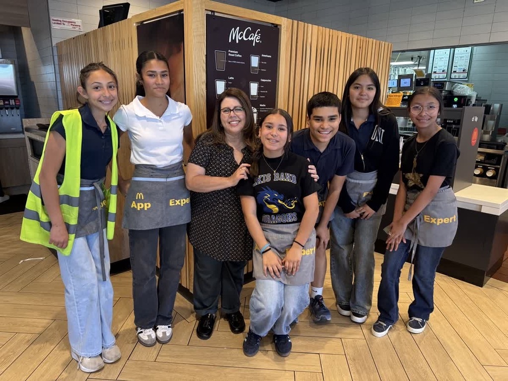 Photo of EKIS faculty, students, and community at Mc. Donald's for a fundraiser.