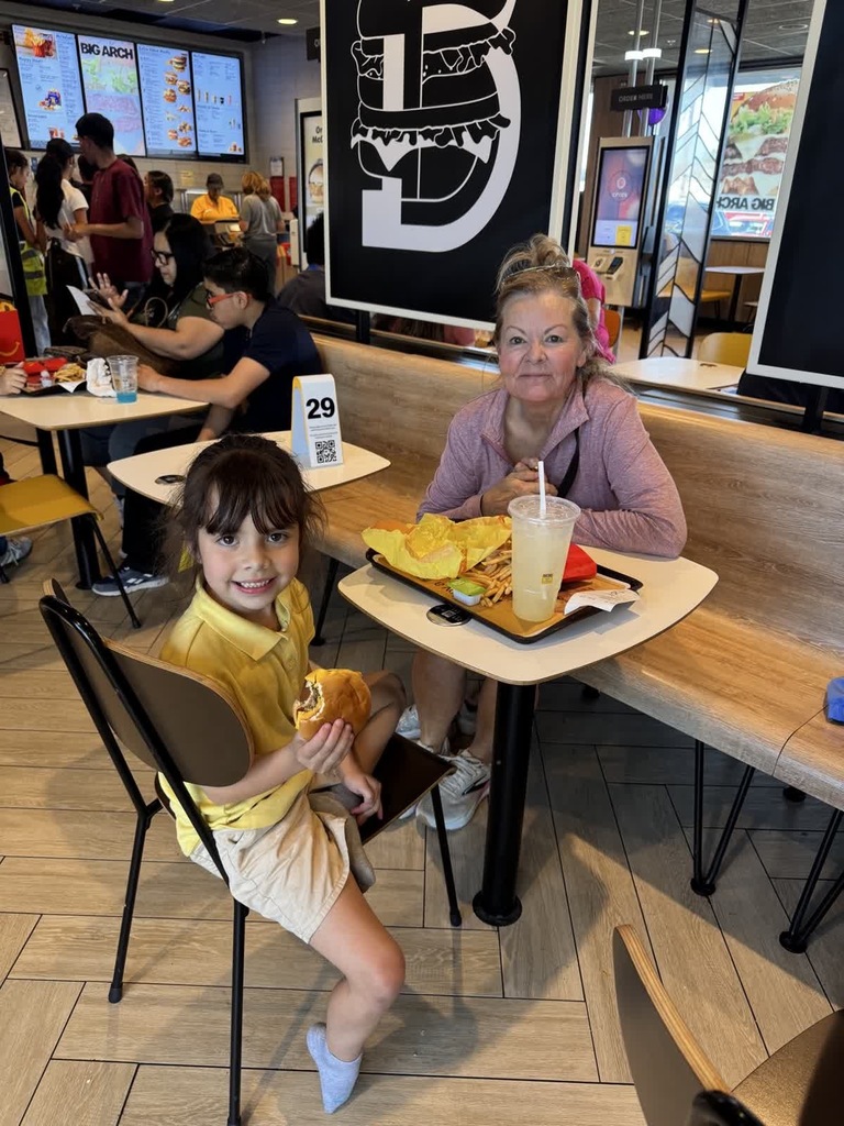 Photo of EKIS faculty, students, and community at Mc. Donald's for a fundraiser.