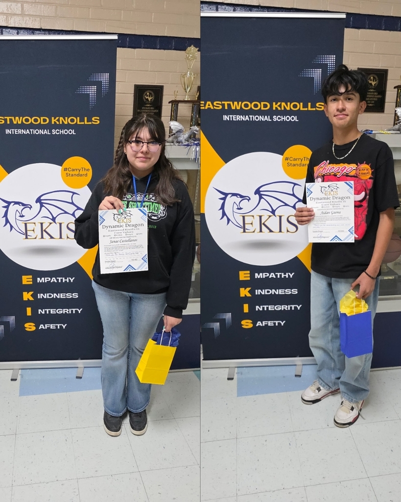 Photo of EKIS students receiving a certificate.