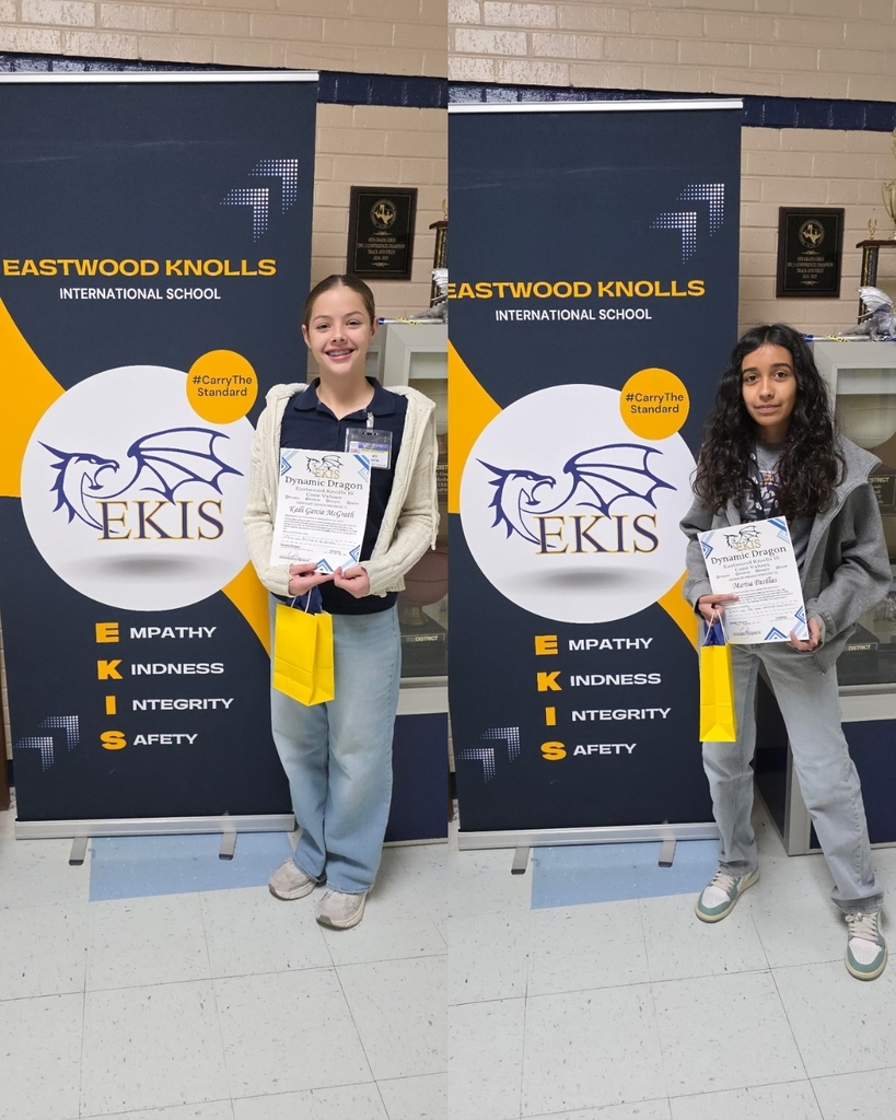 Photo of EKIS students receiving a certificate.