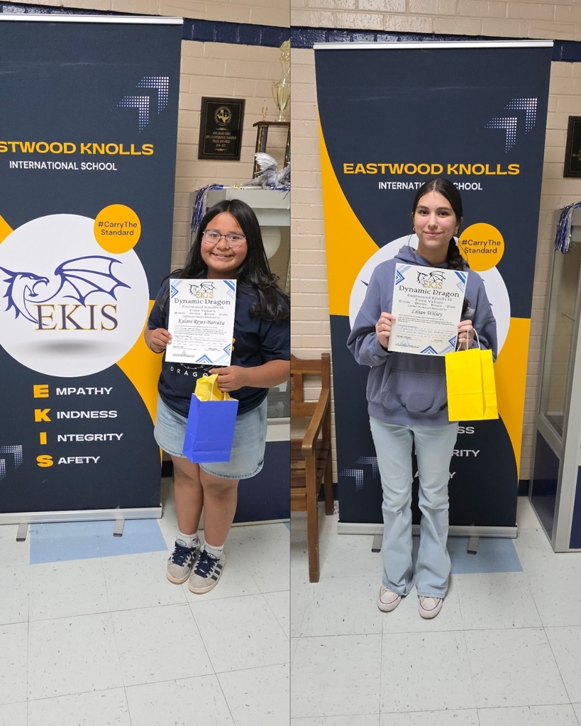 Photo of EKIS students receiving a certificate.