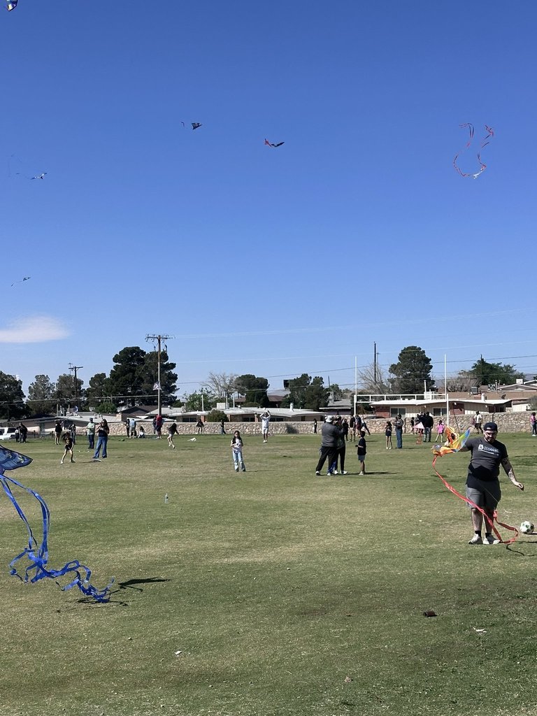Students and parents enjoying Kite day at EKIS during PE.