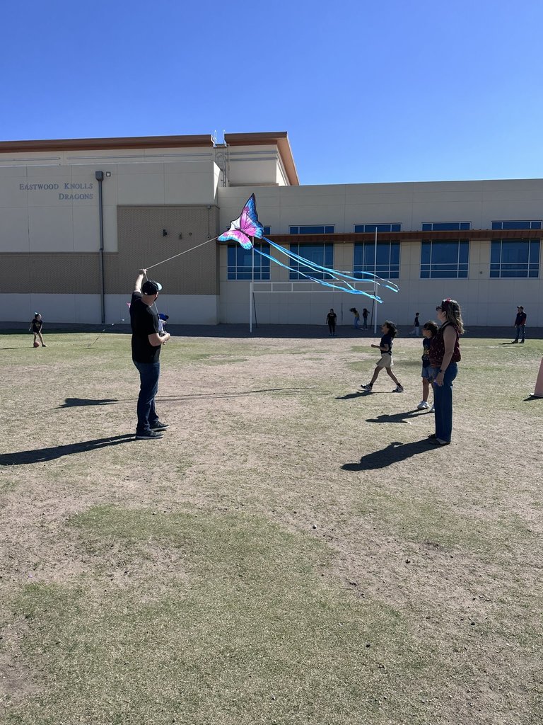 Students and parents enjoying Kite day at EKIS during PE.