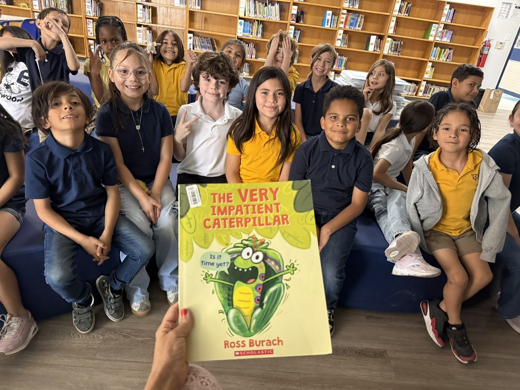 Photo of EKIS students at the school library for story time.