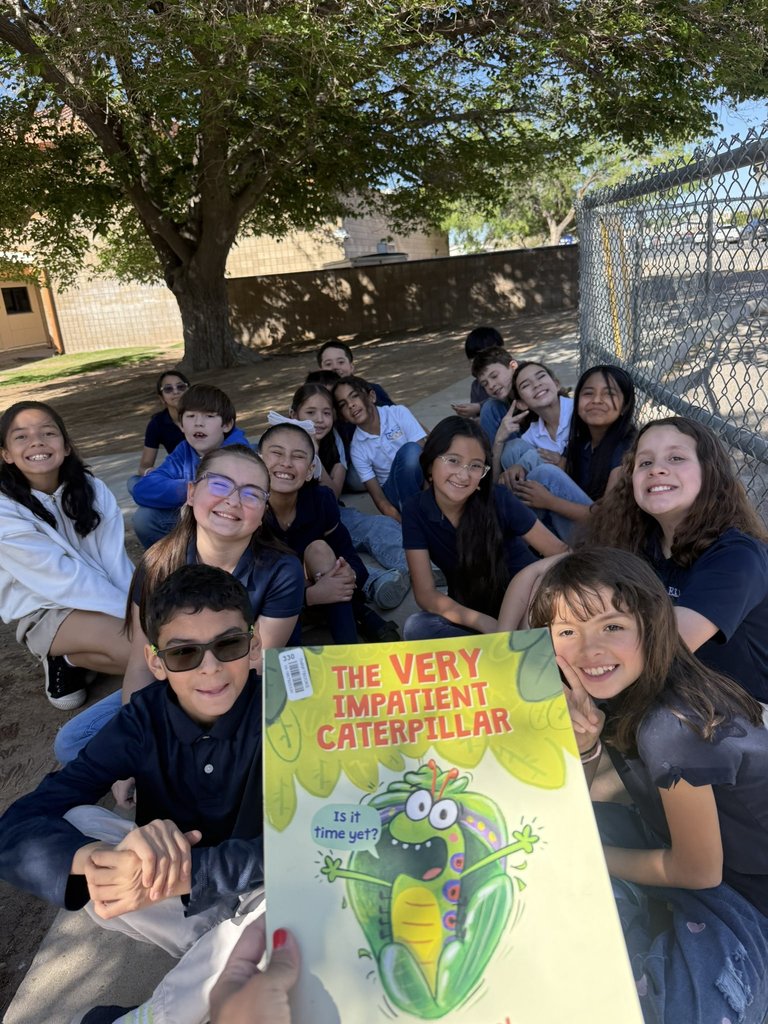 Photo of EKIS students at the school library for story time.