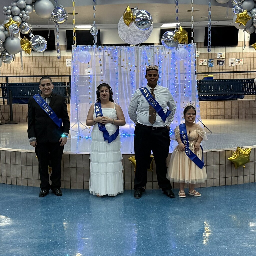silent prom court two couples of students standing