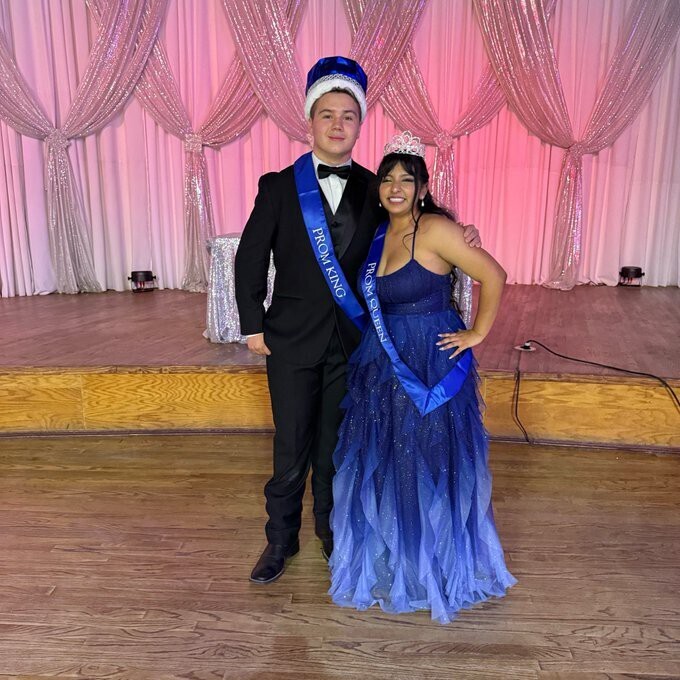 Prom king and queen pose for picture