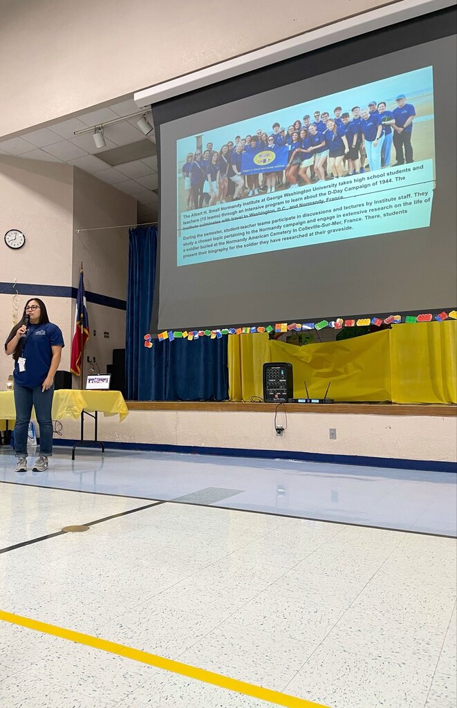 Photo of Ms. Perales presenting her slideshow.