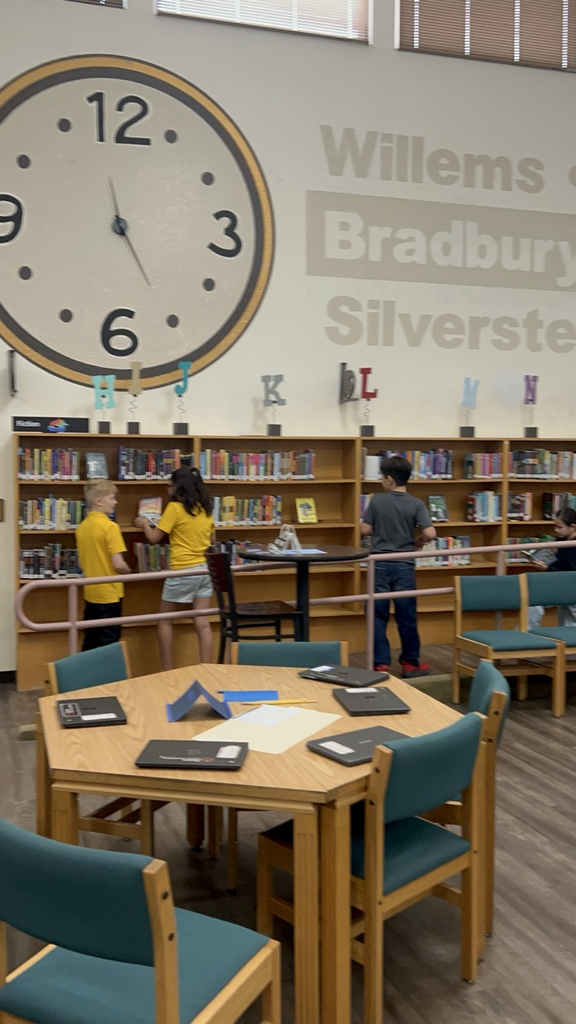 students working in library 