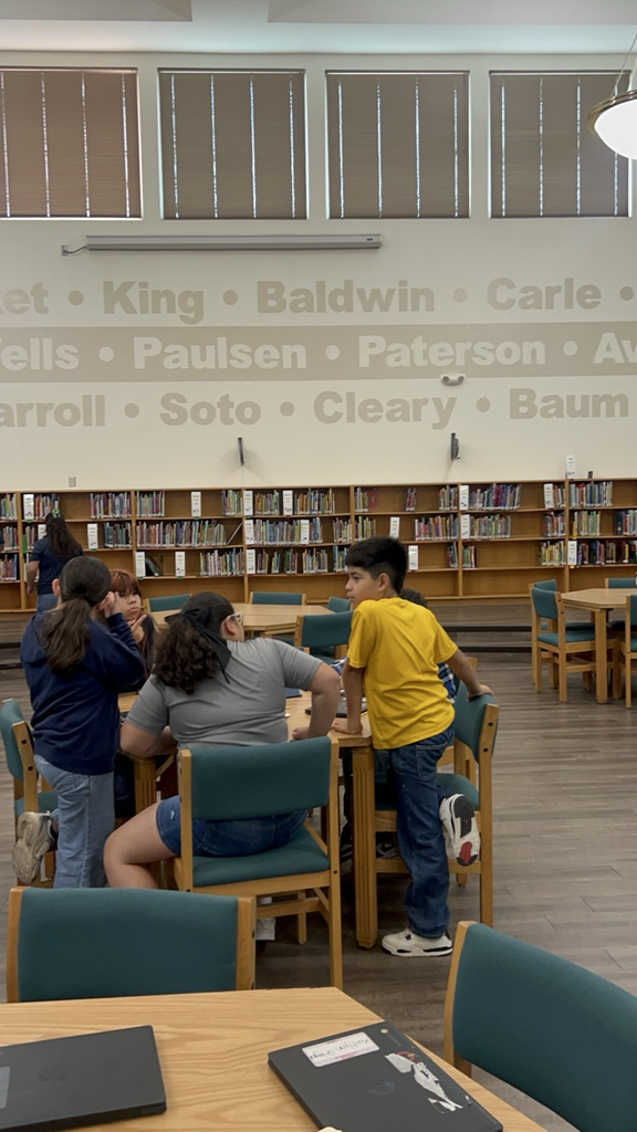 students working in library 