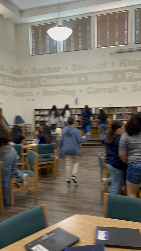 students working in library 