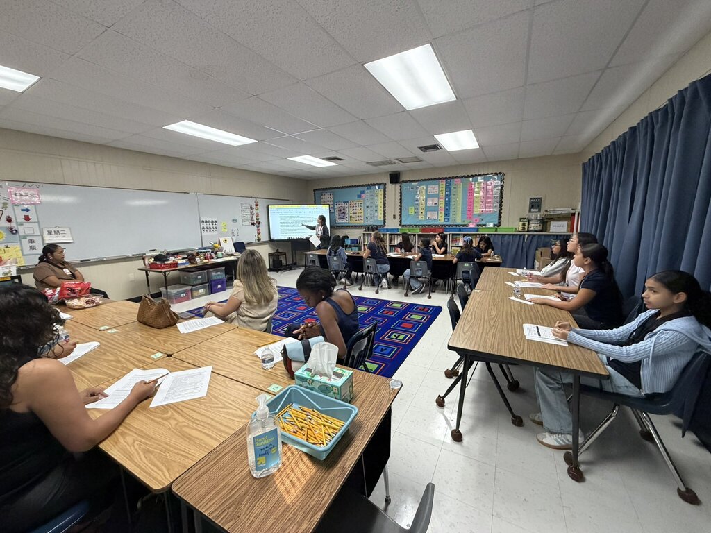 Photo of EKIS Chinese club members meeting to discuss upcoming events such as the Dragon Fiesta and Chinese New Year celebrations.