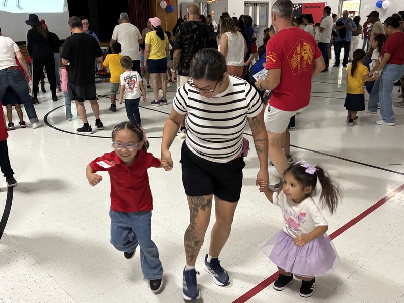 grandma dancing with 2 kids