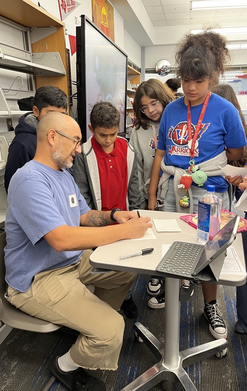 Zeke Pena signing autographs for our amazing Bel Air Middle School students