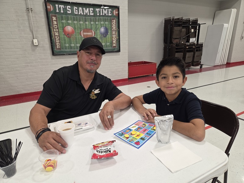 5th grader and Grandpa playing Loteria