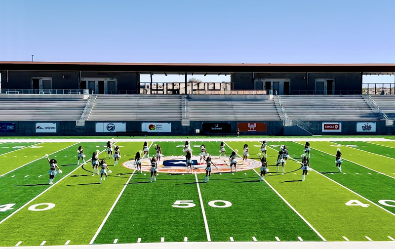 Team Picture of Ysleta Dancing Spirit team on the field at SAC II