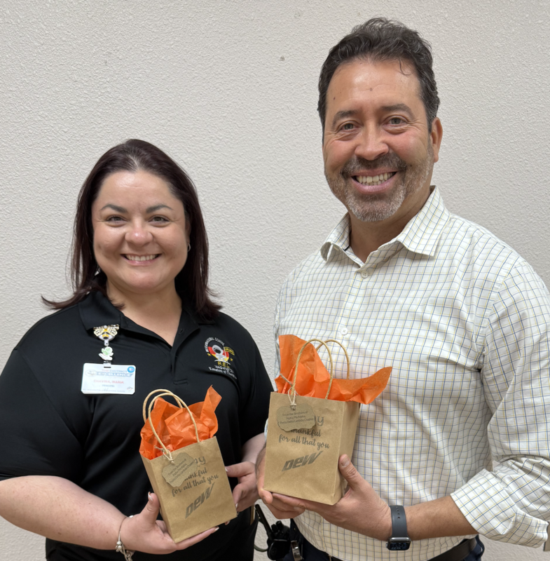 Administrators receiving their gift