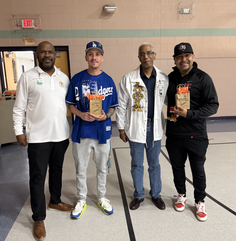 Coaches receiving their gift