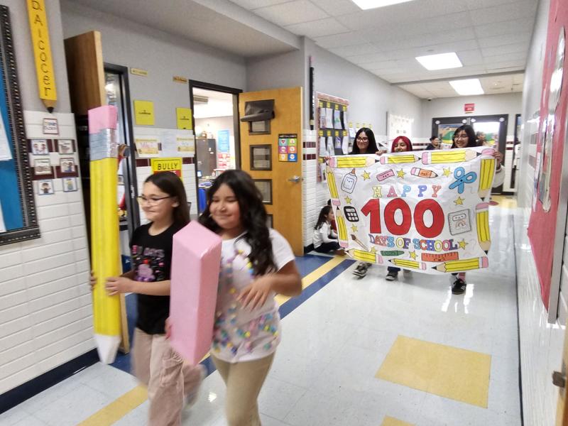 Presa Leadership leads the Parade with 100 day poster 