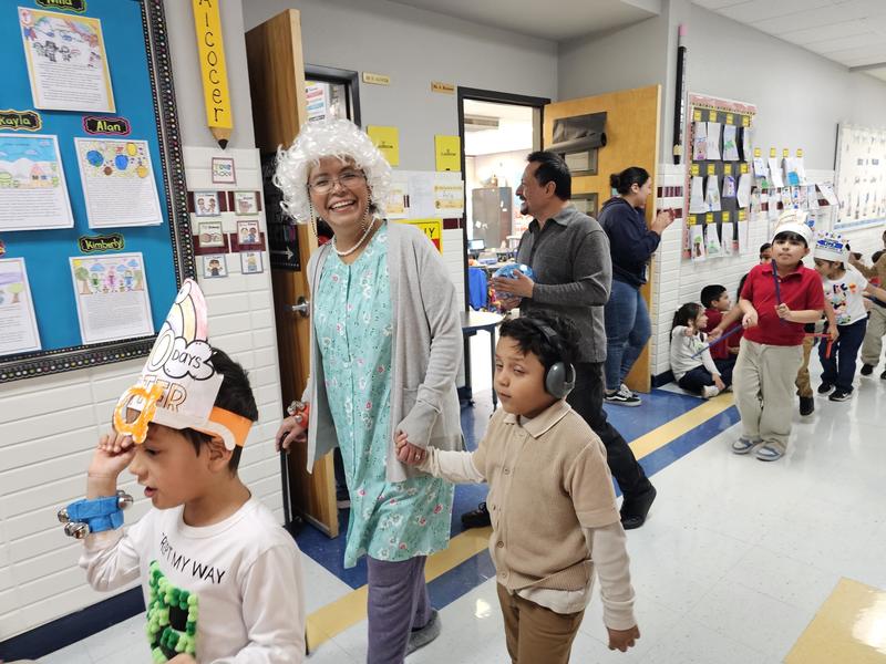 Ms. Calderon walks with her Pre-Kinder students down the 3rd grade hall