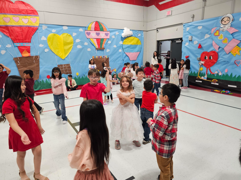 1st and 2nd graders dancing