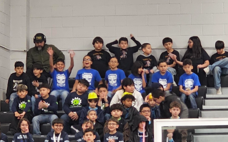 Both teams in the bleachers for the Drivers meeting