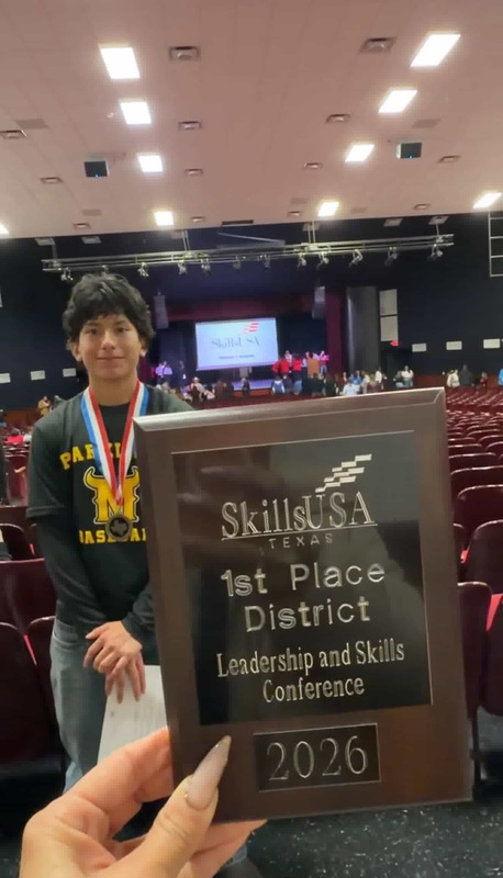 Dylan Rodriguez Poses next to his 1st place regional award plaque