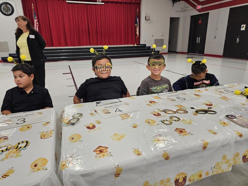 2nd place contestants waiting at the table to start