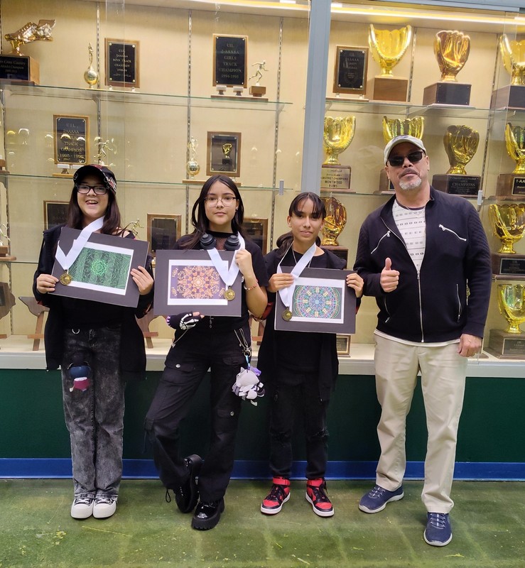 Students posing with awards at Montwood High School
