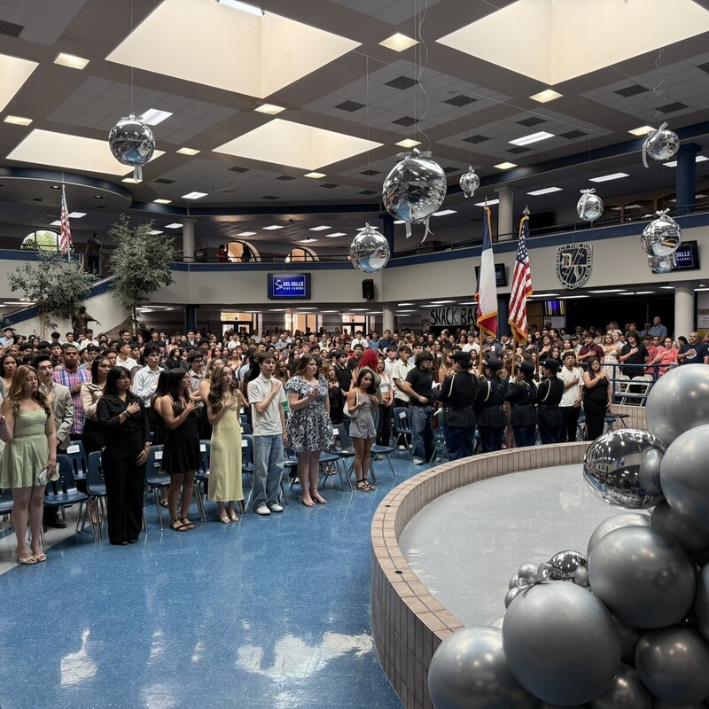 Awards ceremony students display their certificate in DVHS commons