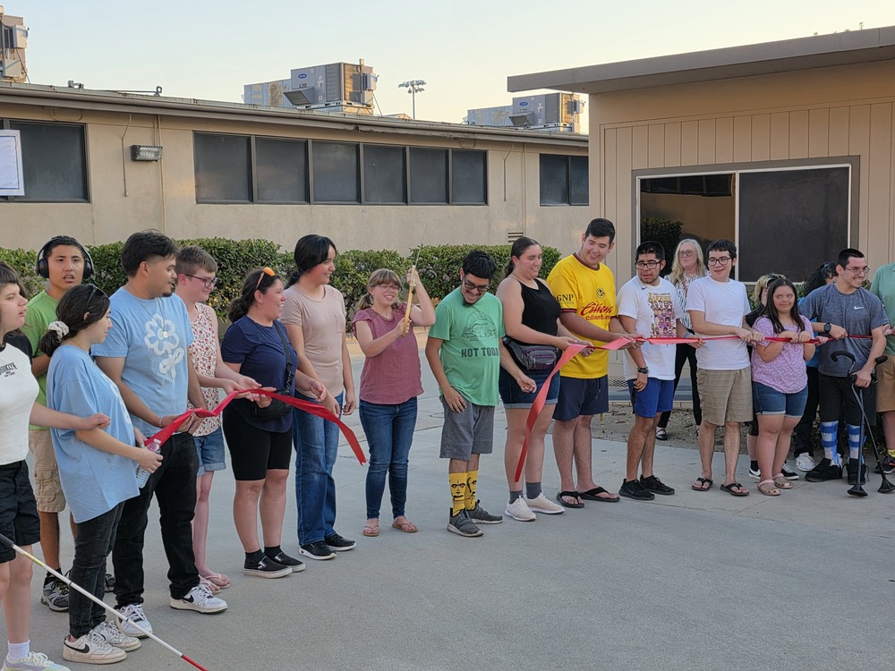 VTP Students cutting the ribbon