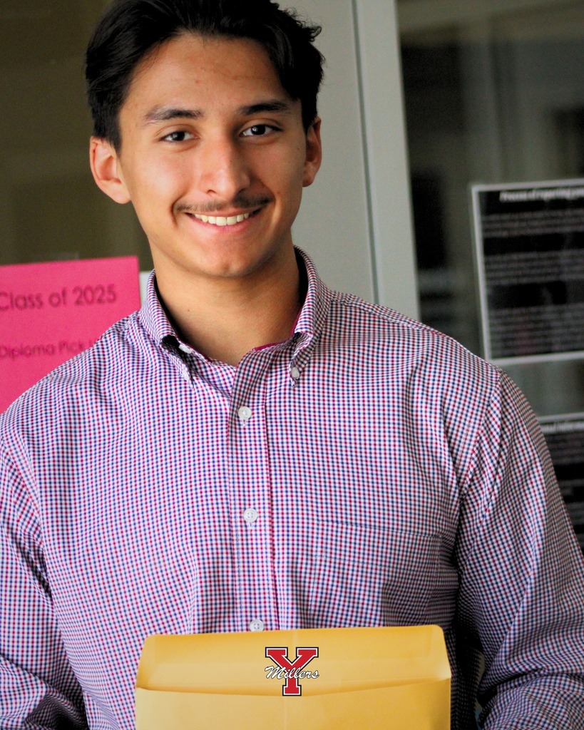 Boy with short black hair holding a yellow envelope and smiling with a red and white polo