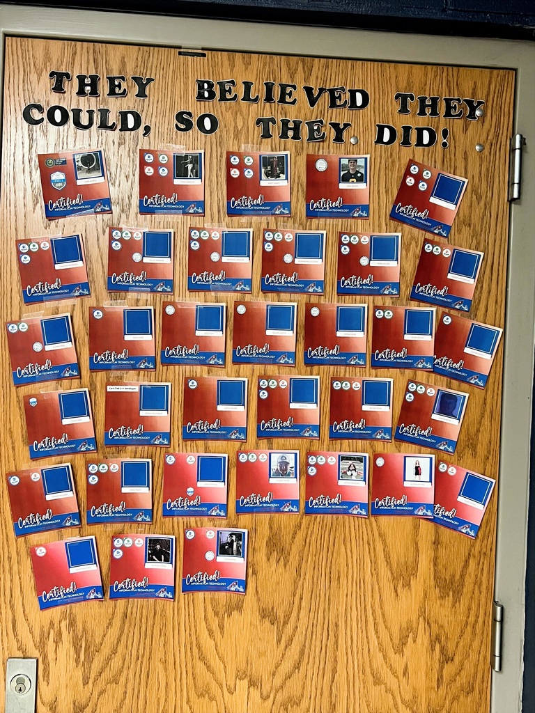 picture of the door with the students accomplishments