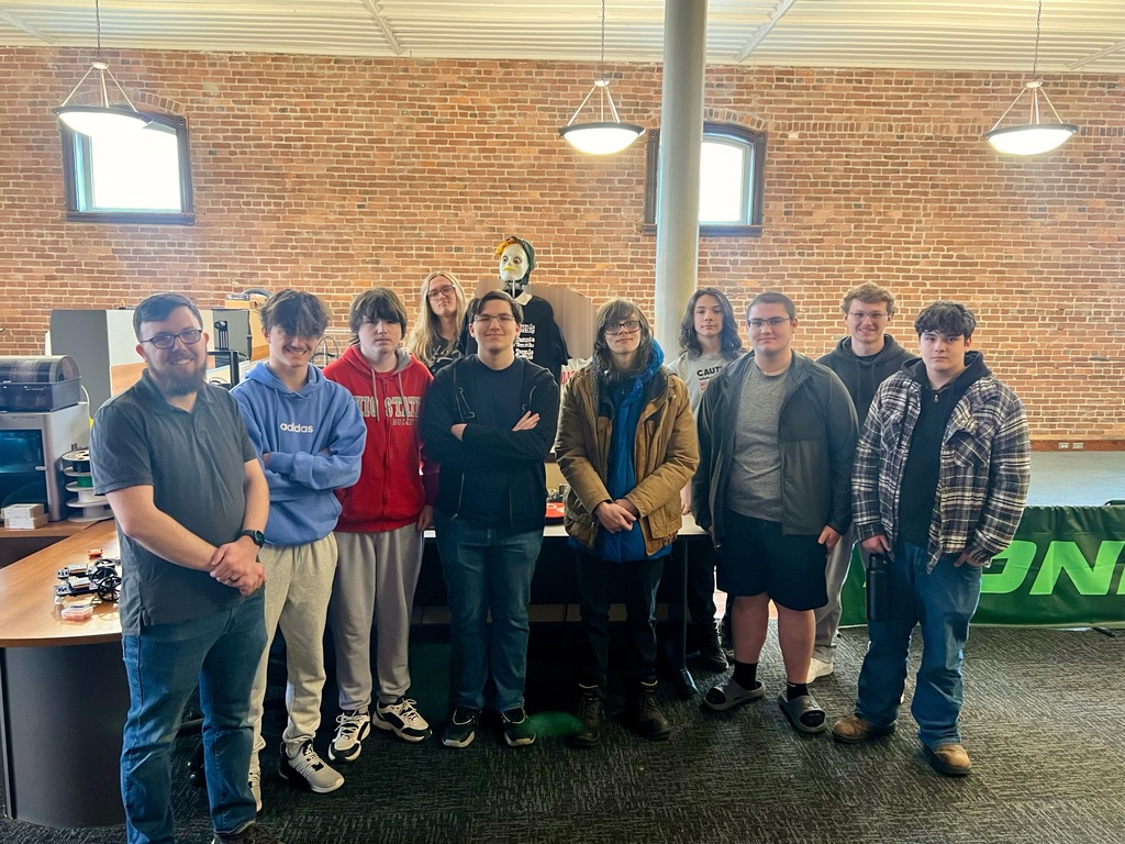 picture of students with Yost Labs staff member