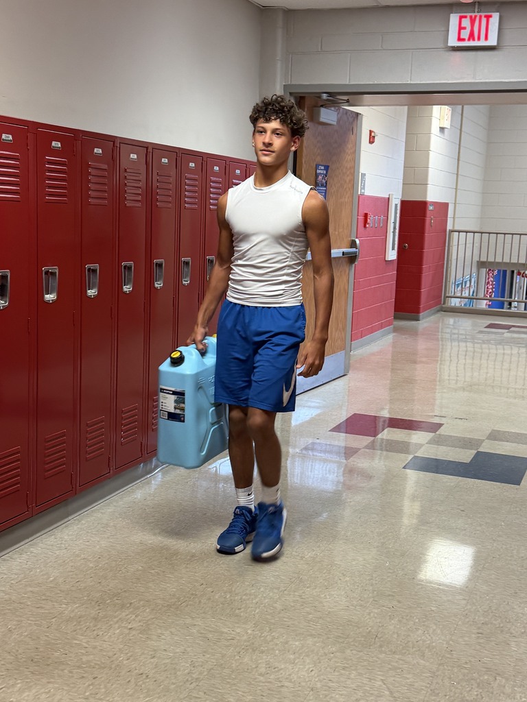 Some of our football players decided that water carrying should be added to their workout routine!